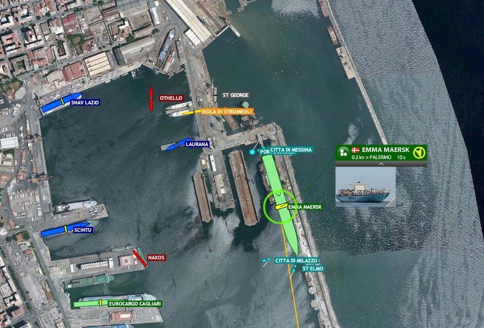 Tracking Emma Maersk using FleetMon while she is alongside a port terminal and also showing other ships nearby.