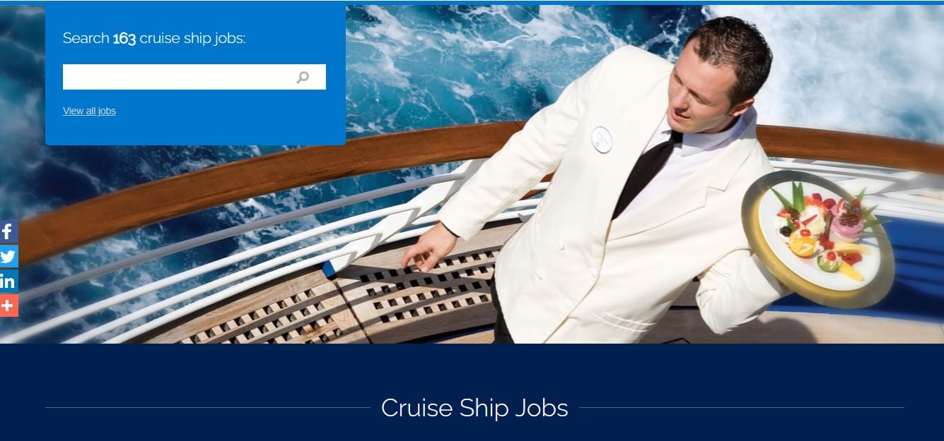 A well-dressed waited delivering food on a yacht.