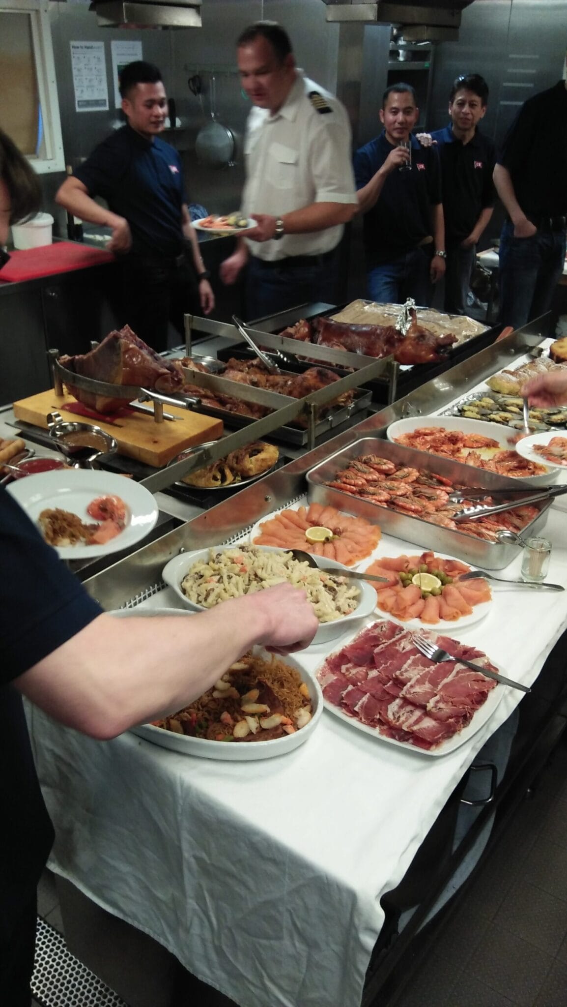 Dishes on board a vessel celebrating Christmas and the crew going all merry around it.