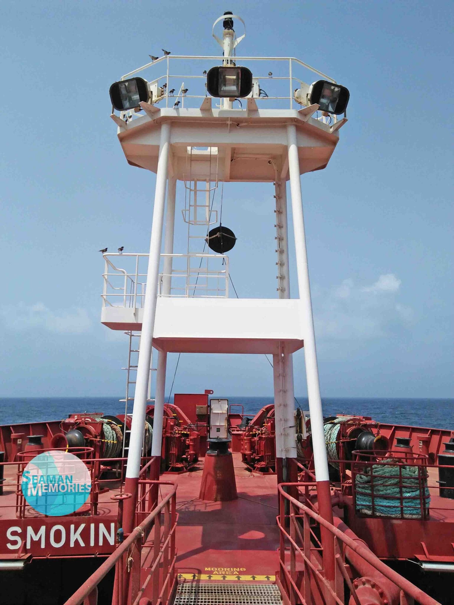 A black Anchor Ball raised on the Forward Station of a tanker vessel.