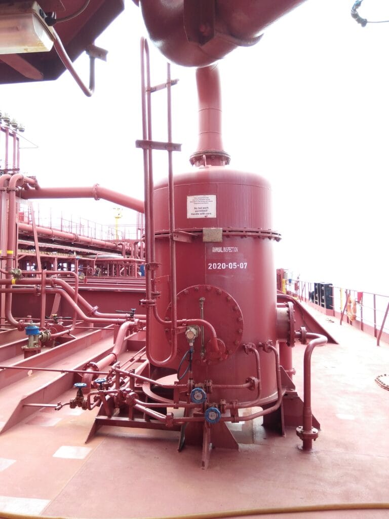Scrubber meets the Eye. A Deck Water Seal of an IG System installed on deck and stenciled with its annual inspection date.