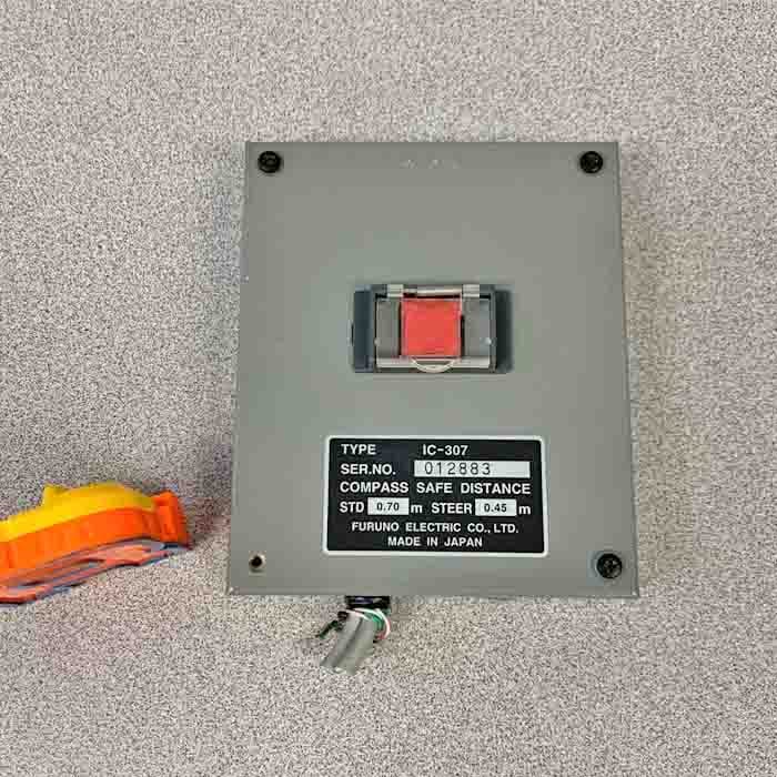 A red button for activating the Ship Security Alert System.