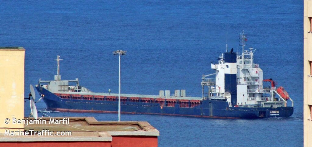Cargo vessel Azburg leaving port.