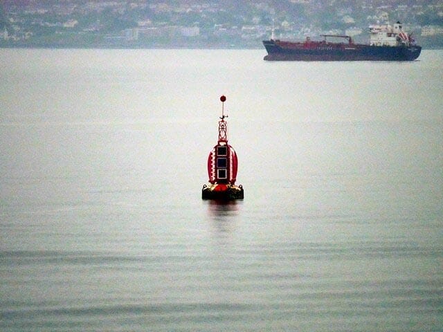 A Safe Water Mark having red and white vertical stripes.