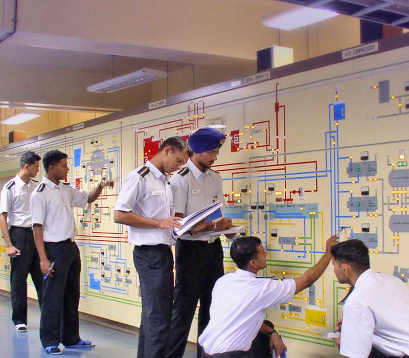 Cadets of Indian Maritime University studying in the simulator.